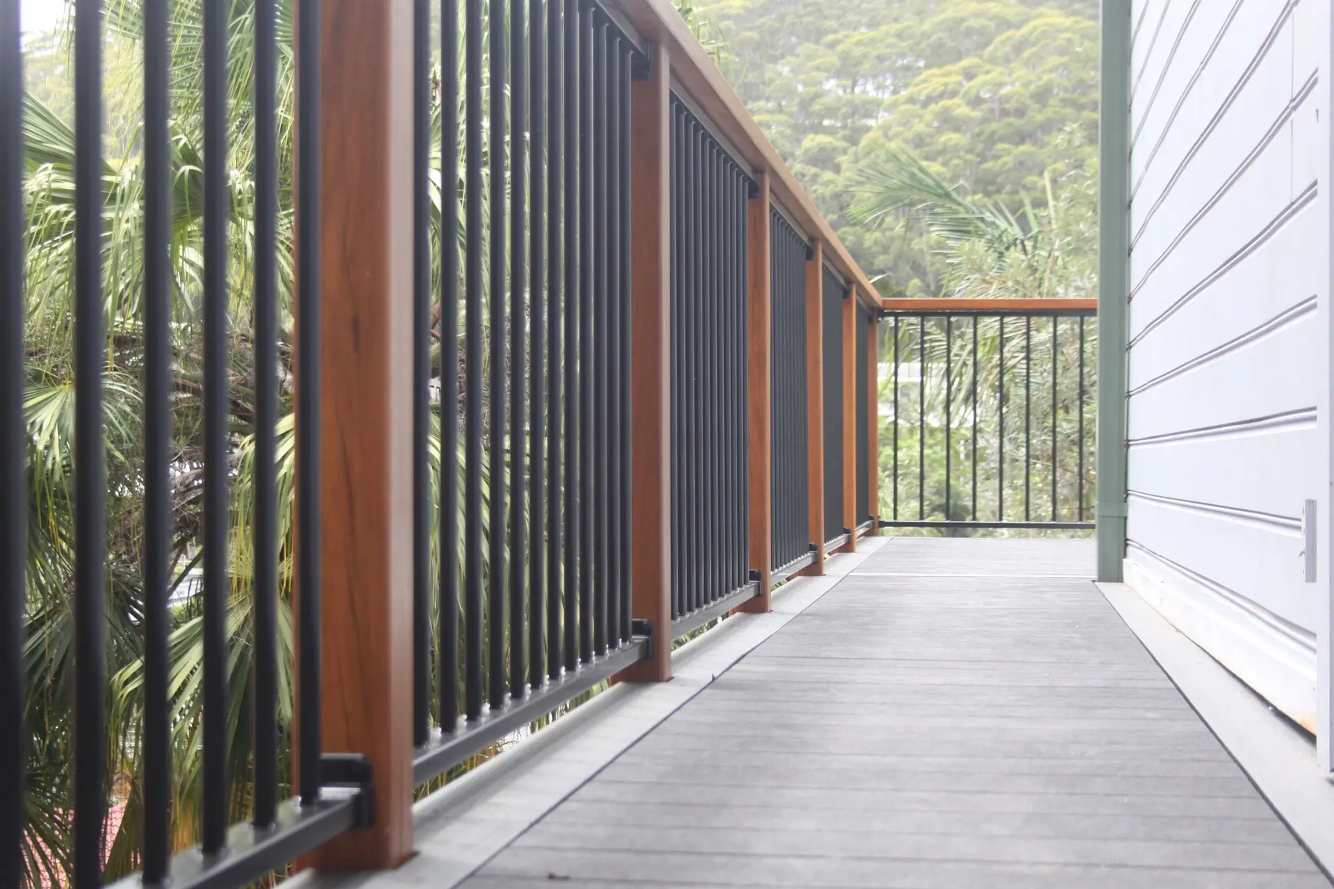Coastal deck and detailed hardwood handrail in Macmasters Beach