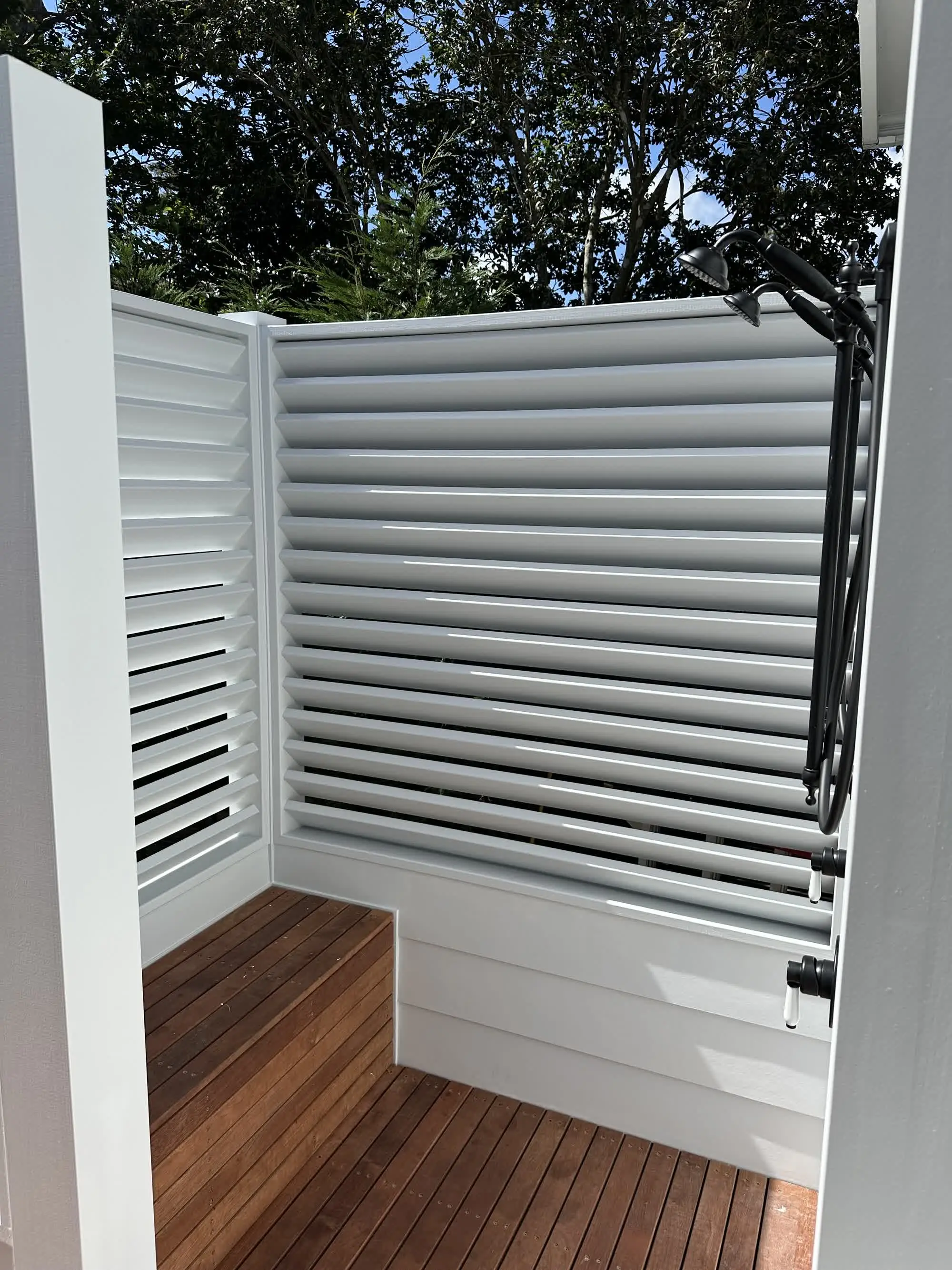 Outdoor shower and Merbau deck during construction in Erina Heights