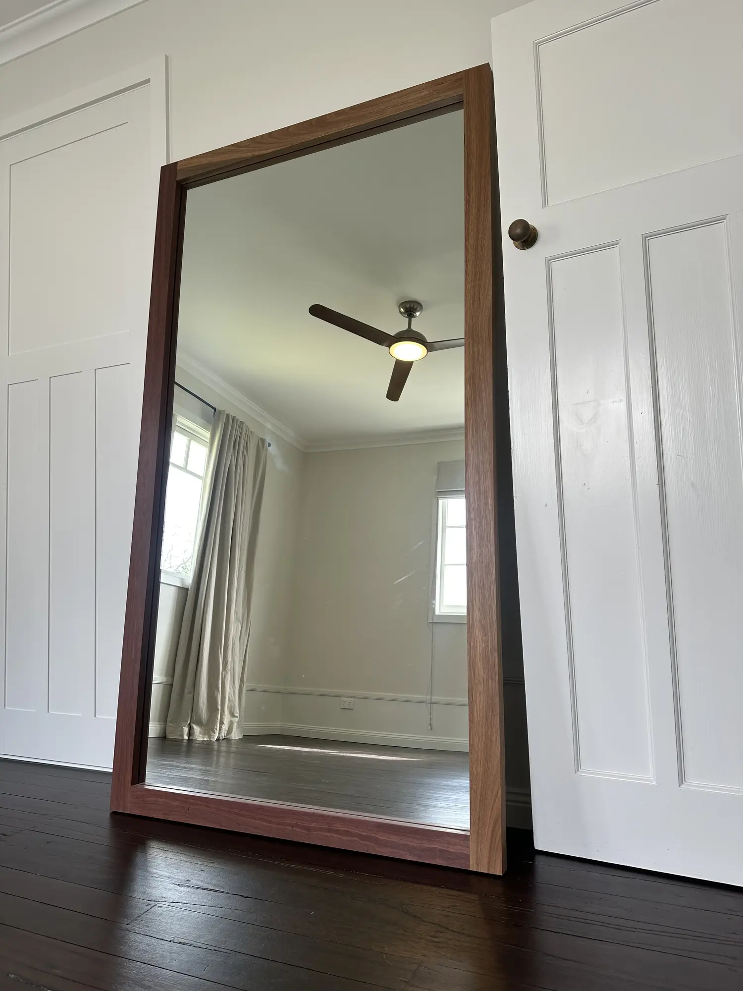 Custom floor mirror framed in solid Spotted Gum timber
