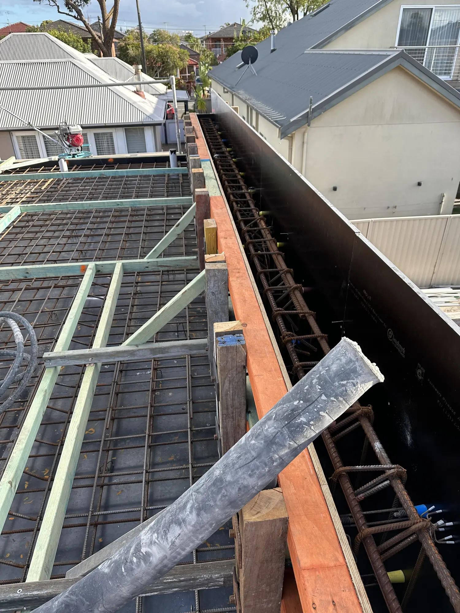 Edge formwork and reinforcement prepared before a concrete pour in Mascot