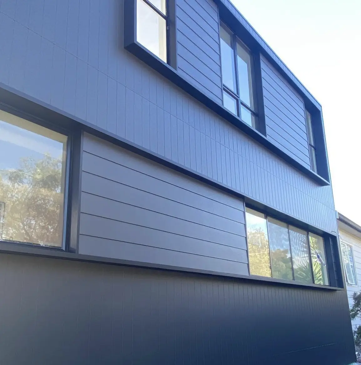 Crisp horizontal cladding junctions on a completed Pagewood facade
