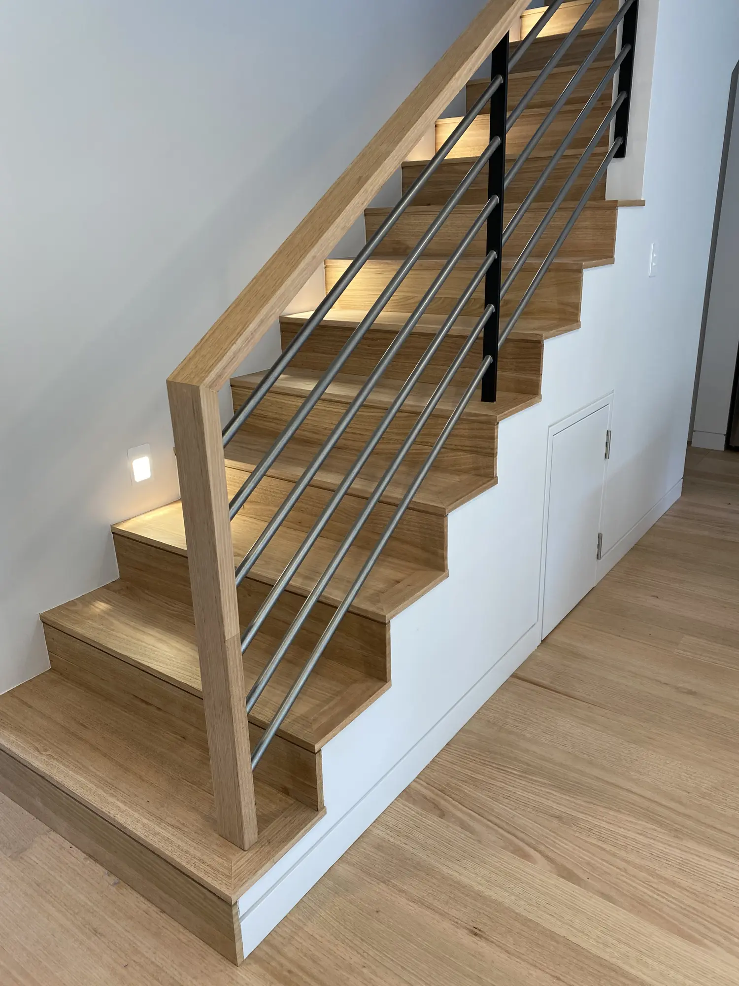 Turning hardwood staircase and metal balustrade completed in South Coogee