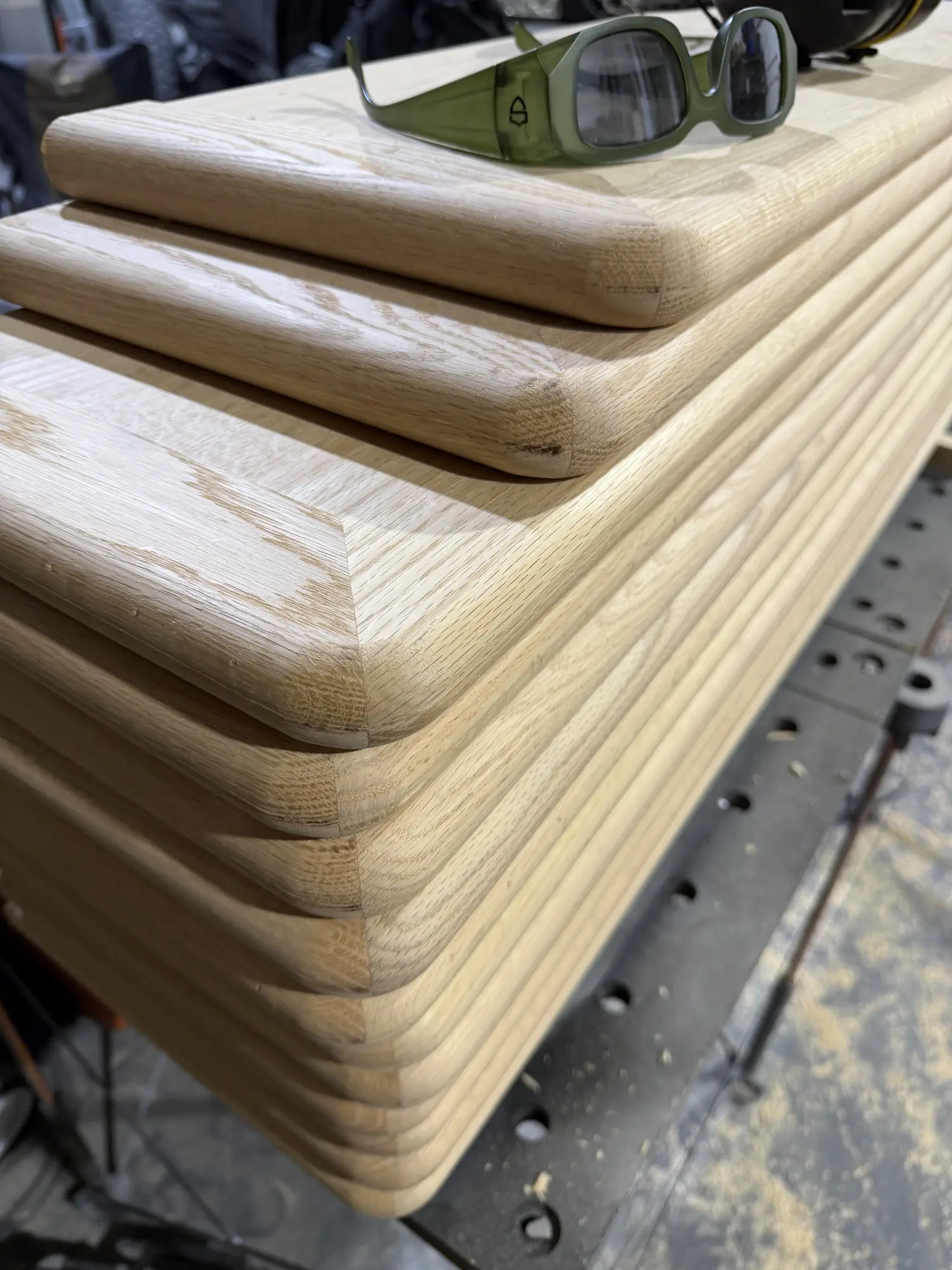 Finished American Oak tread edges stacked after workshop machining